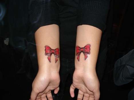 bow tattoos on wrist