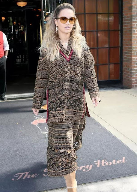 Rita Ora's wore a V-neck knitted crochet suit.