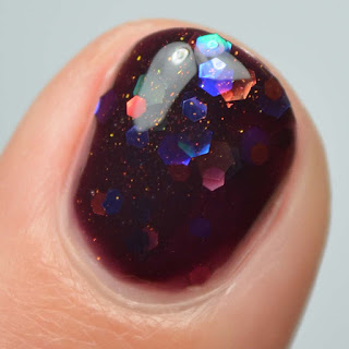 oxblood nail polish with iridescent glitter