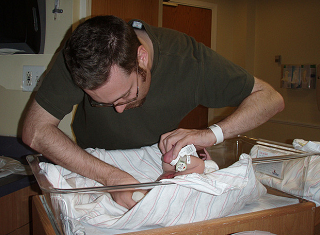 Image: Dad's First Diaper Change, by Christi on Flickr