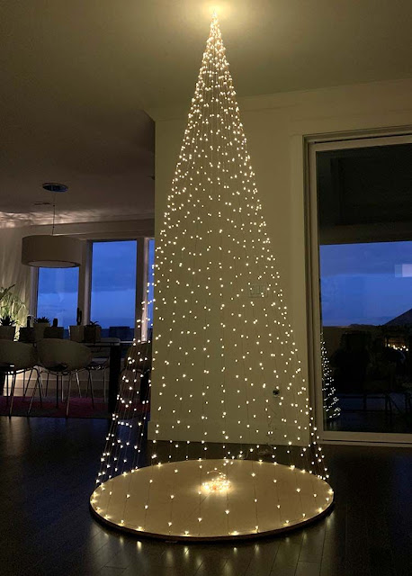 twinkle lights designed as xmas tree