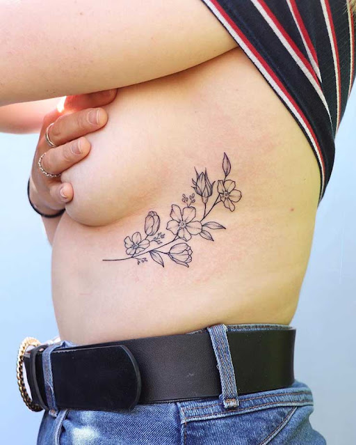 rib cage tattoos female