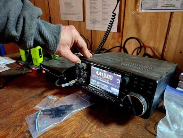Fortitude Ranch Nevada manager Brandon M demonstrates a ham radio on March 2, 2023.
