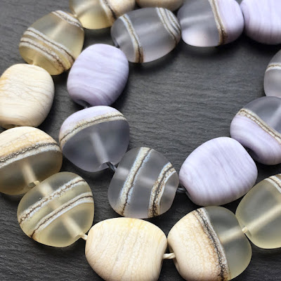 Tumble-etched lampwork glass pebble beads by Laura Sparling