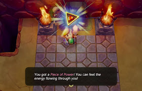 screenshot of Link picking up a Piece of Power inside the Tail Cave