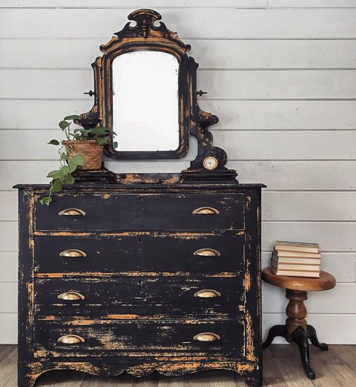 Chippy black antique dresser