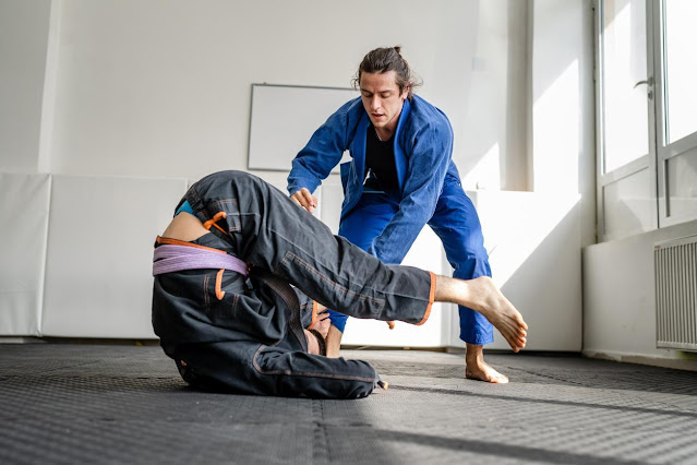 BJJ fighters demonstrate the importance of good posture for balance and control.