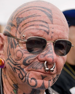 Extreme Face Tattoos and Piercing