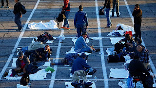 Homeless Americans resting at the parking lot amidst coronavirus