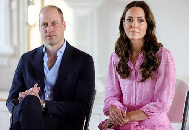 Kate Middleton wore a new pink marble-zebra pattern pleated shirtdress by Rixo. Nadia Irena Maya gold earrings