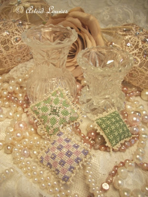 Embroidery little cushions with beads