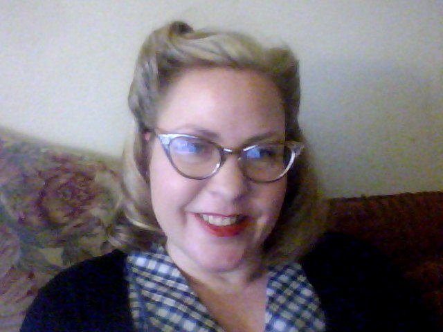  for my hair to go with it and well what is more 40's than Victory rolls