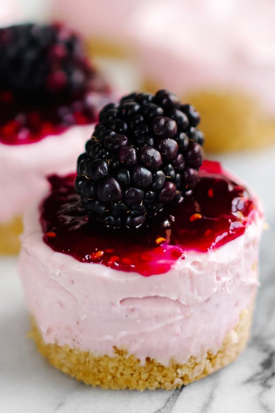 Adorable No Bake Mini Blackberry Cheesecakes are ultra fresh, vibrant, and simple to make with no oven (or even stove) required! Perfect for spring or summer. #nobake #minicheesecake #blackberry
