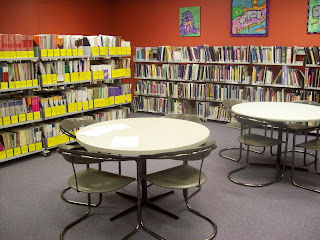 The library with reading tables at Women's Health Victoria