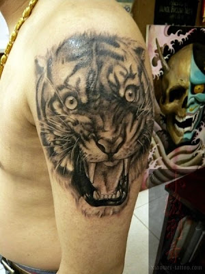 Download. This tiger seems very surprised in this free tattoo design.