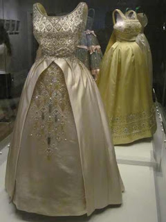 Dresses Worn By The Queen On Display At Kensington Palace.