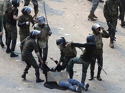 undressing a Muslim woman protester in Egypt