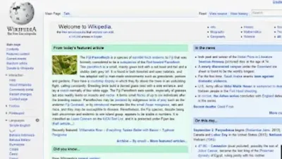 A screenshot of the Wikipedia main page in English, showing the logo, the search box, and the featured article.