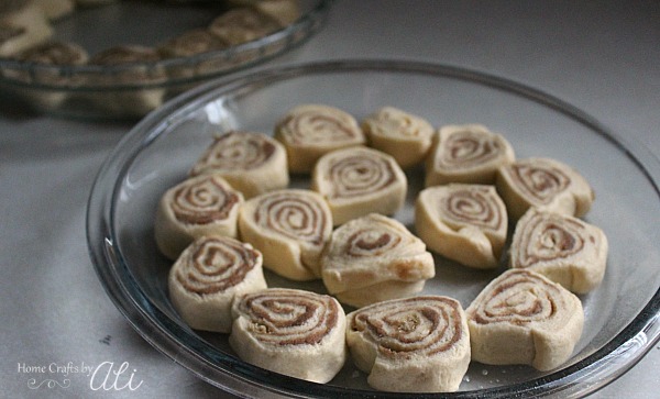 cinnamon roll slices ready to bake in pan