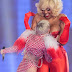 LOOK!!! Crazy Singer Miley Cyrus Sucking Another Woman Boobs On Stage [PHOTOS] 