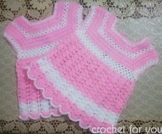 http://translate.google.es/translate?hl=es&sl=en&tl=es&u=http%3A%2F%2Fcrochetforyou.weebly.com%2F1%2Fpost%2F2013%2F12%2Fbaby-girl-dress.html