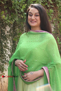 Actress Sonia Agarwal Stills in Green Anarkali Dress at Agalya Tamil Movie Launch  0010.jpg