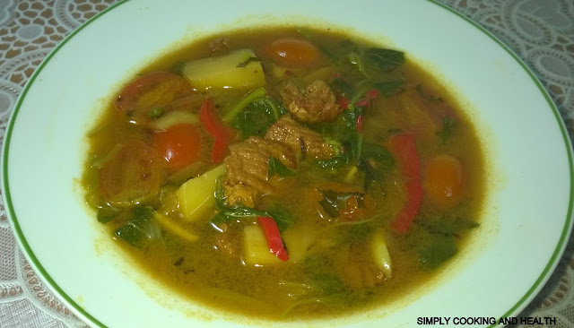 Spicy beef soup with spinach