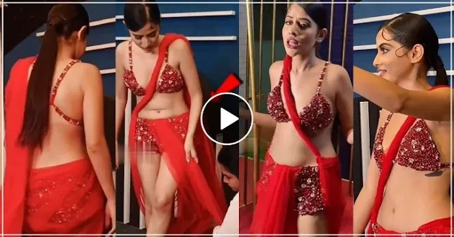 Urfi Javed in red open sari