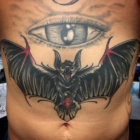 10 Bold Stomach and Sternum Bat Tattoos