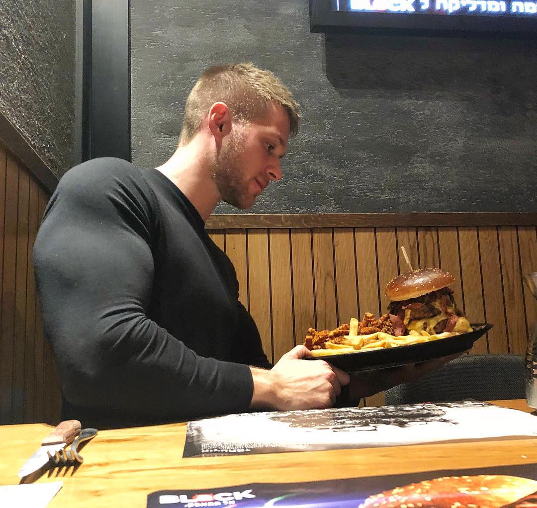 sexy-guy-eating-food-yaron-tomer-strong-body