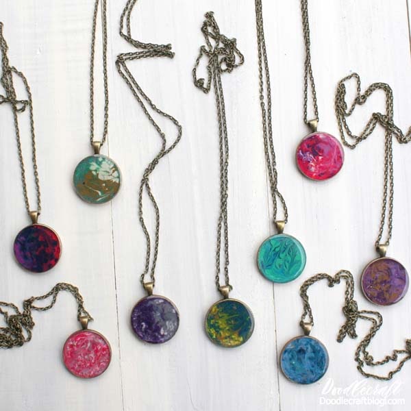 Learn how to make marbled pendants with melted crayons and covered with high gloss resin