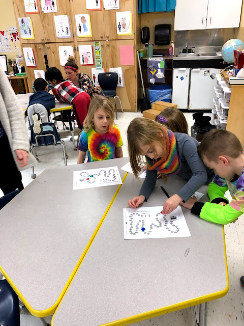 Kindergarten Students play Money March during Math