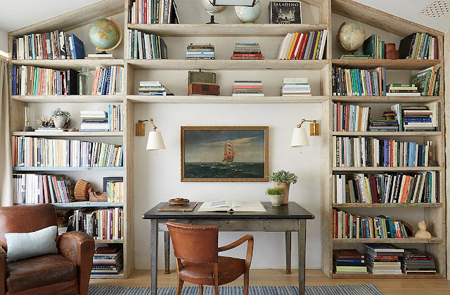 An office with builtin bookshelves at Patina Farm