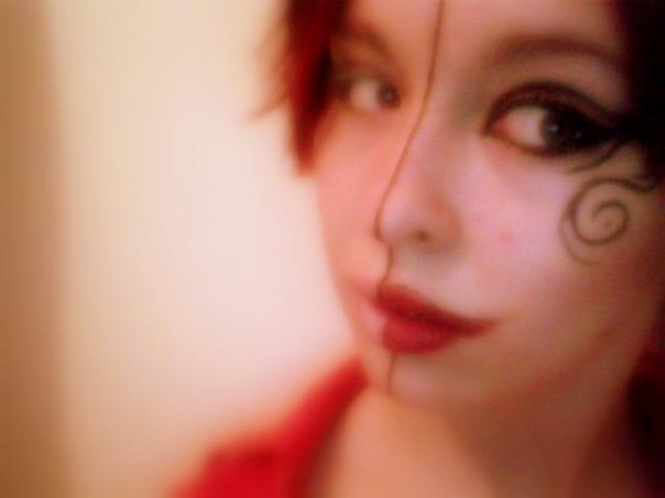 joker face makeup. The style of mouth make-up was