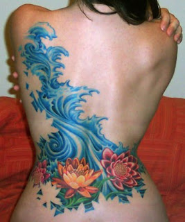 Flower art tattoo design on sexy girl's backbody