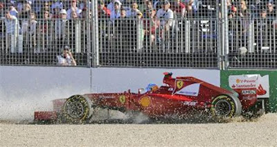 Ferrari, Alonso, spint het grind in