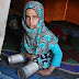 Syria refugee uses metal cans to replace her legs