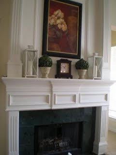 Thrifty Decor Chick: How to decorate your mantel.