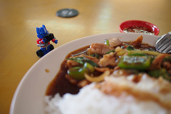 Kreon Optimus Prime taking a picture of food