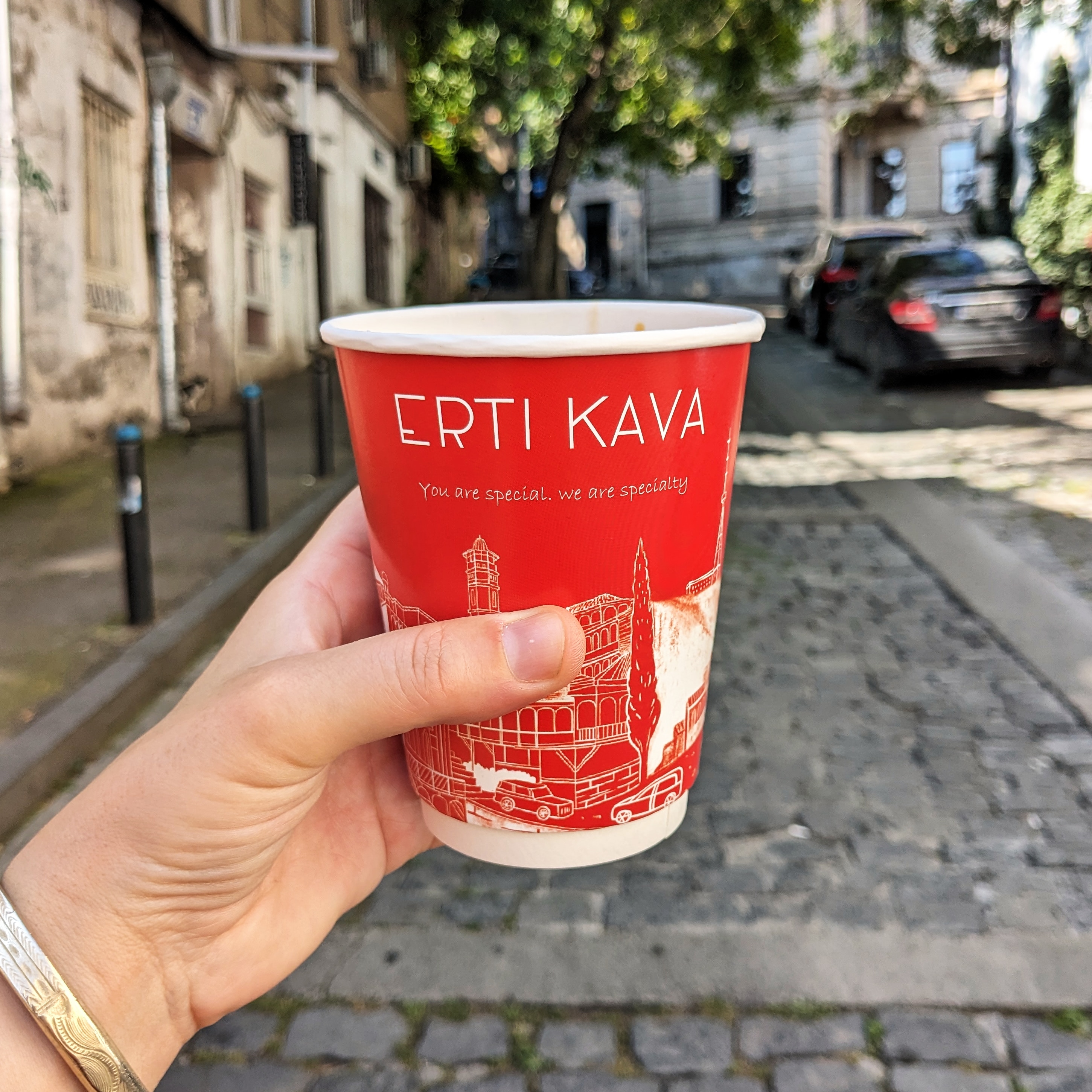 Americano in a red and white take out cup from cool Tbilisi coffee shop, Erti Kava