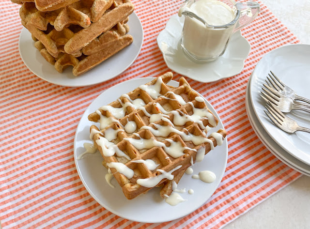 Food Lust People Love: What could be more perfect for Easter breakfast or brunch than sourdough carrot cake waffles with a drizzle of cream cheese syrup? Not a single thing!