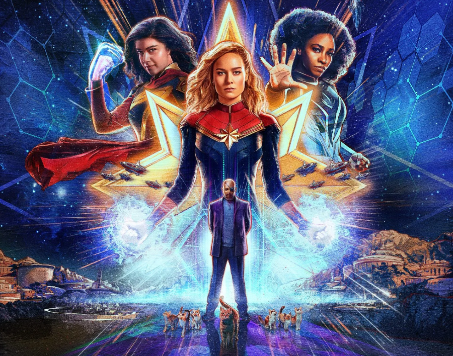 One of the theatrical posters for The Marvels. Featuring Iman Vellani as Kamala Khan / Ms. Marvel, Brie Larson as Carol Danvers / Captain Marvel, Teyonah Parris as Monica Rambeau and Samuel L. Jackson as Nick Fury, surrounded by a bunch of Flerken.