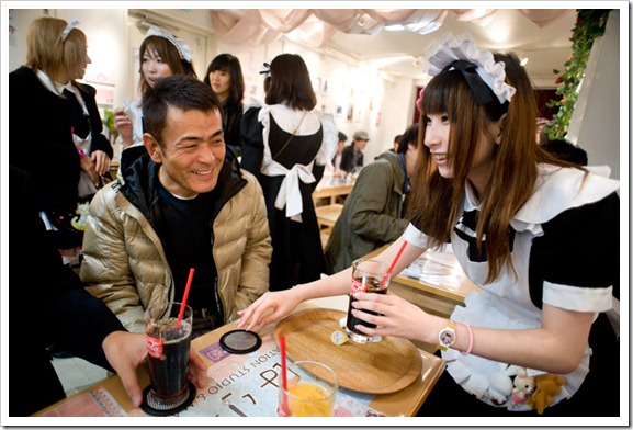 A 'maid cafe' in Akihabara, Tokyo. A staple of Japanese popular culture, the cafes offer a distinctive atmosphere, where subservient maids in Victorian outfits role-play to please customers, who are treated and greeted as 'Masters.'