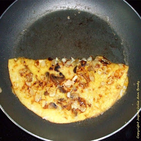 step two Easy Cheesy Omelet with Mushrooms and Onions