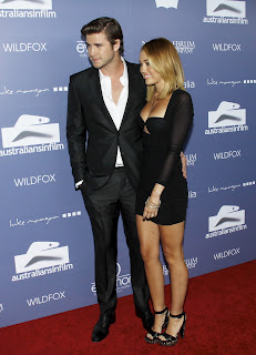Miley Cyrus on the red AIF red carpet with her fiance