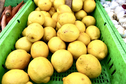 bright yellow lemons at the farmer's market