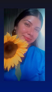 Rostro de mujer huancaína con una flor
