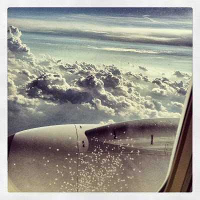 airplane window clouds
