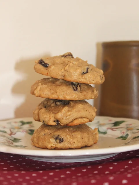 Oatmeal raisin cookies with a mug of tea.