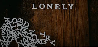 Loose letters lined up to spell out the word `Lonely´.